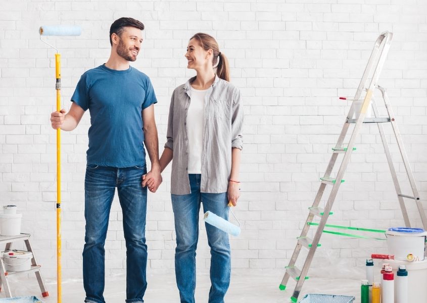 couple painting a room for 10 easy home refresh projects blog