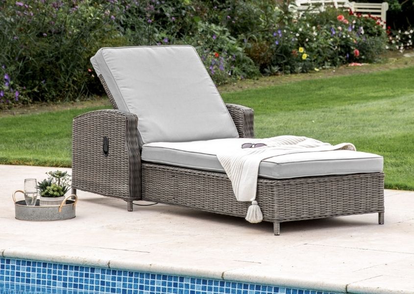 rattan garden sun loungers with off white cushion