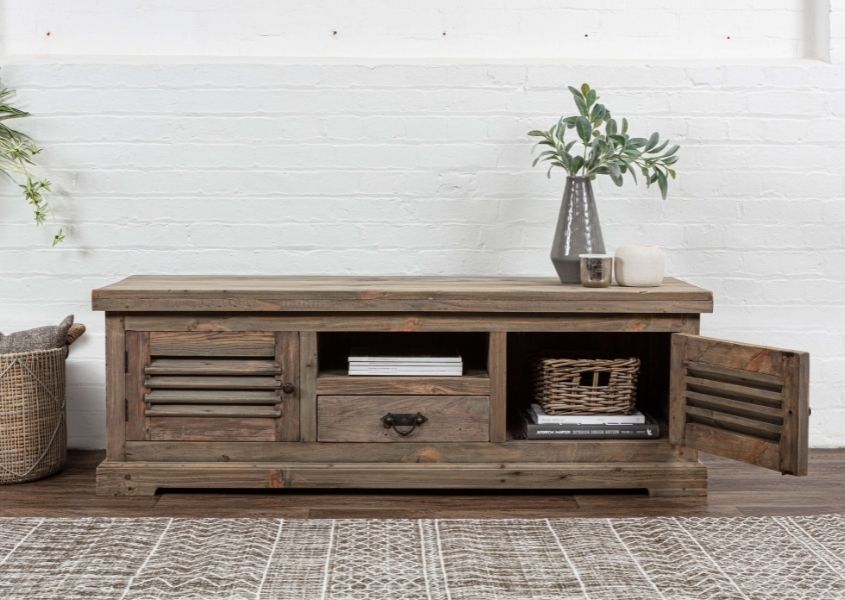 reclaimed wood tv stand with two louvered cupboards and middle drawer