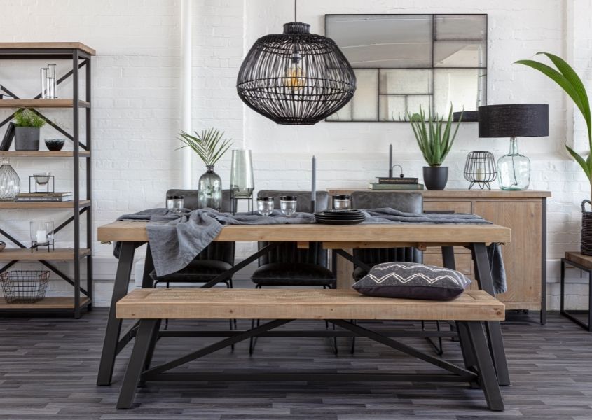 industrial dining table with black rattan pendant light