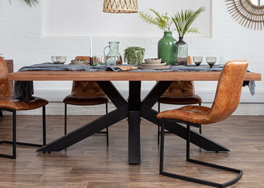 industrial oak dining table with tan leather dining chairs