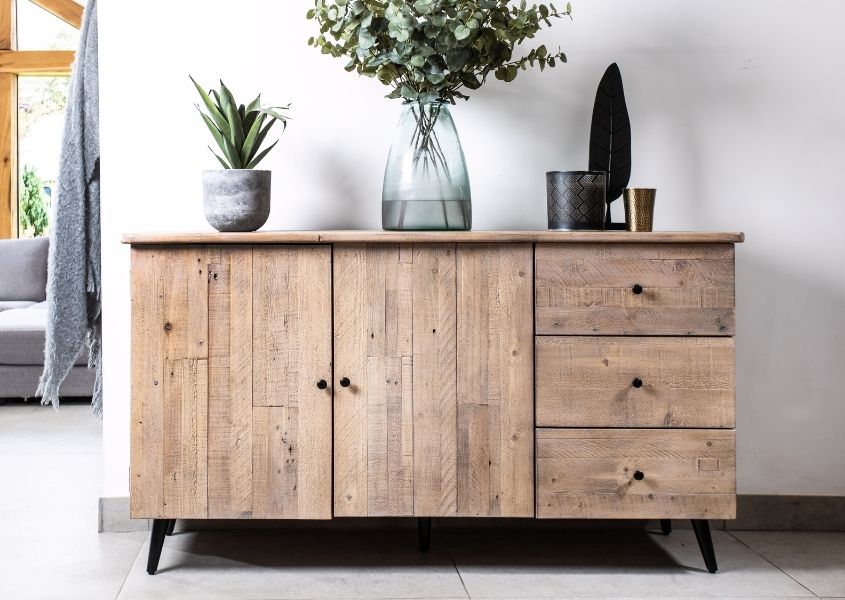 pale wood reclaimed wood sideboard with three drawers and two cupboards