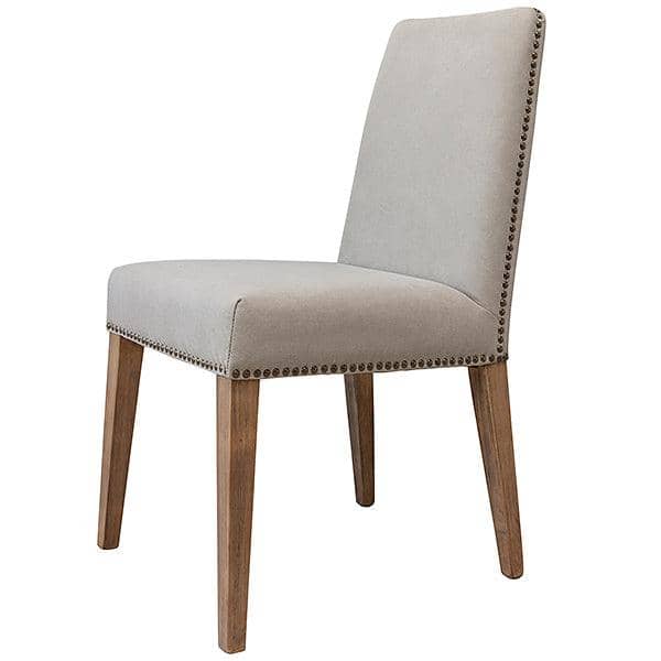 Cream fabric dining chair on light wooden legs