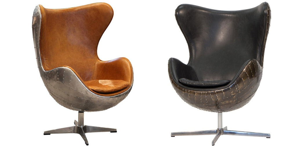 Pair of aviator style winged back leather armchairs