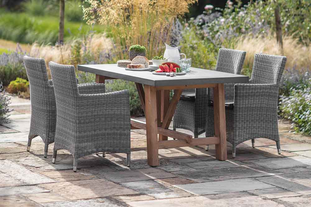 Chilson Dining Table and Rattan Dining Chairs