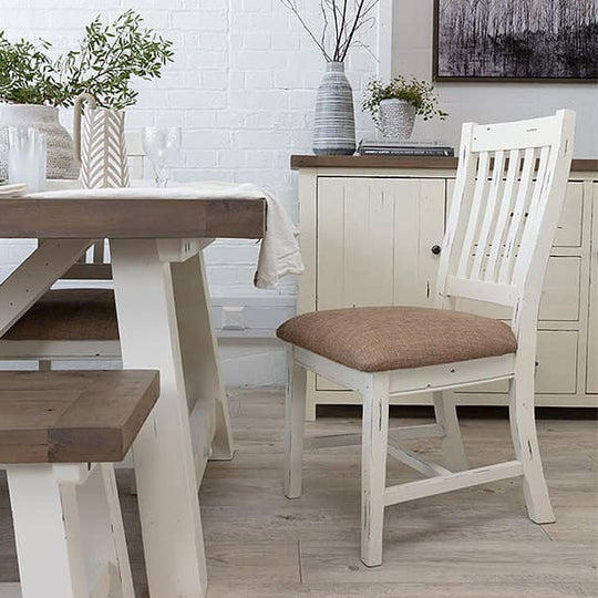 White farmhouse dining chairs with upholstered seat