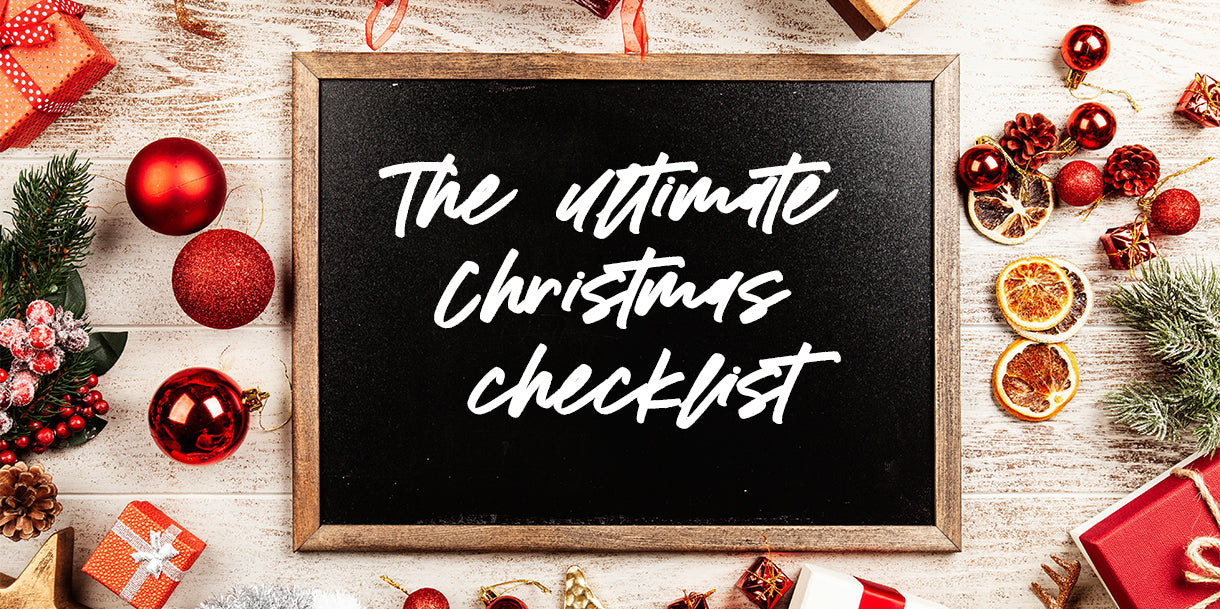 The ultimate Christmas checklist with X Mas decorations in the background
