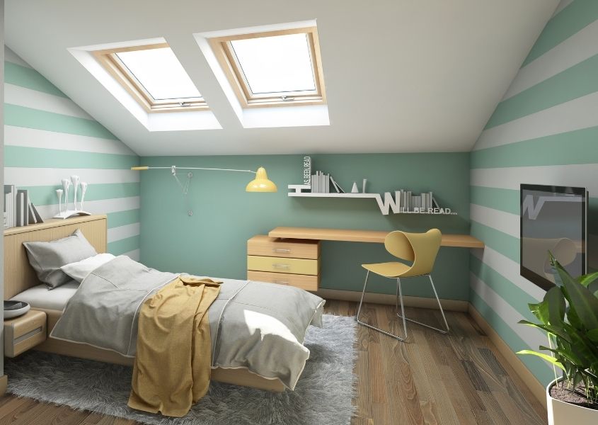 children's bedroom with wooden desk and chair