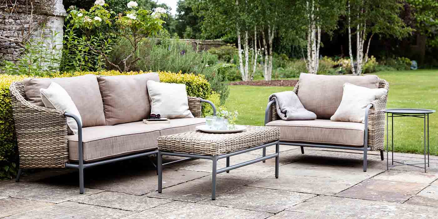 Heyshott Rattan Sofa Set with Coffee Table and Armchair in Garden