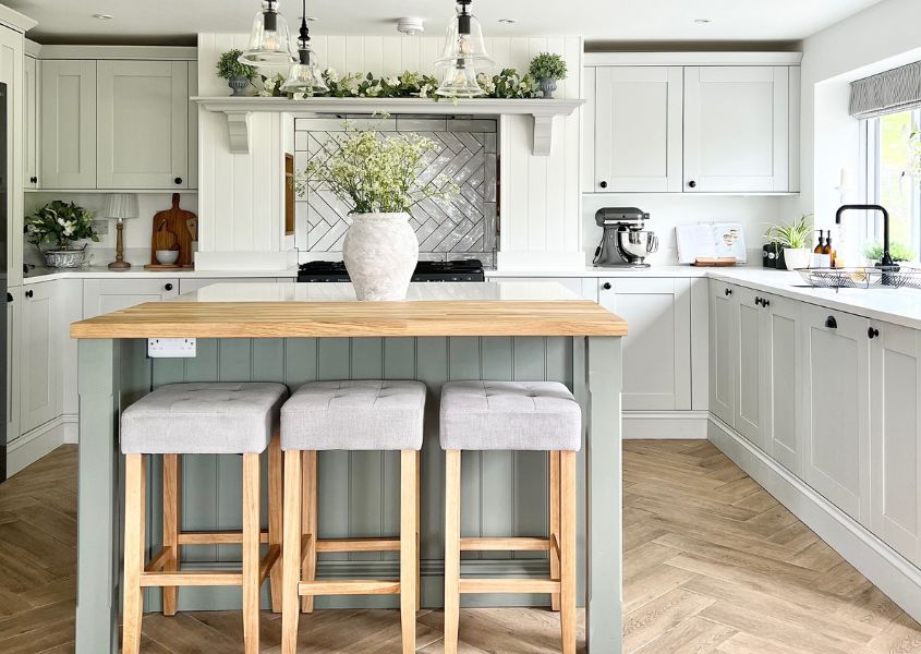 modern farmhouse kitchen with island and fabric bar stools