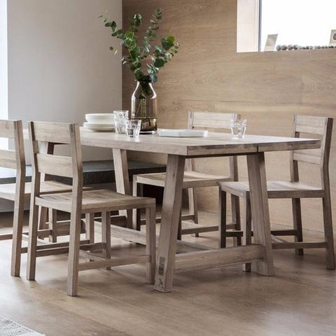Oak dining table with matching oak dining chairs