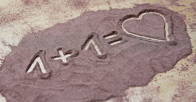 Mathematical calculation drawn in the sand for love