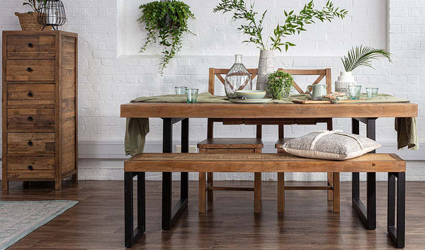 Standford Reclaimed Wood Dining Table with green plants on top