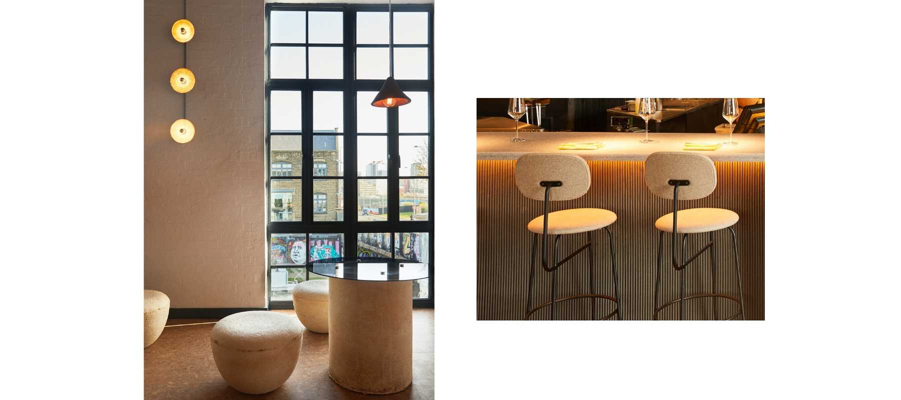 Cream bar stools in front of large industrial window and bar stools at bar