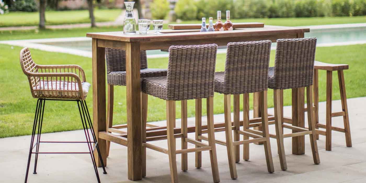 Outdoor Bar Table with Drinks and Rattan Stools