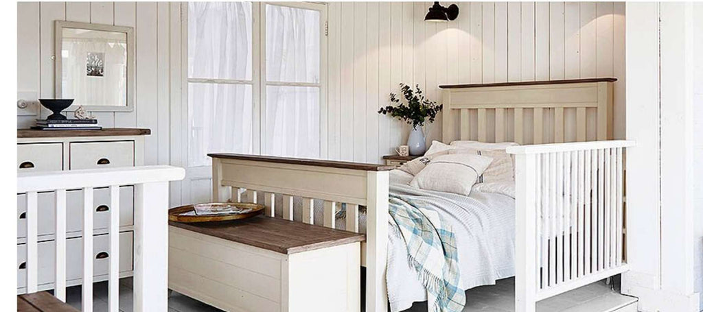 White reclaimed wood bedroom furniture, including bed and wood blanket box