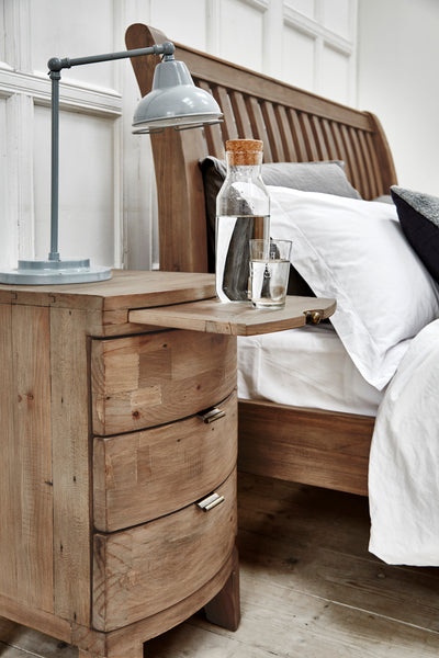 Reclaimed wood bedside table with pull out drawer and grey spot lamp