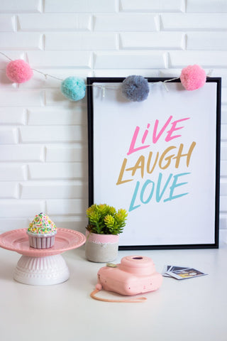 Live, laugh, love print with pom pom garland