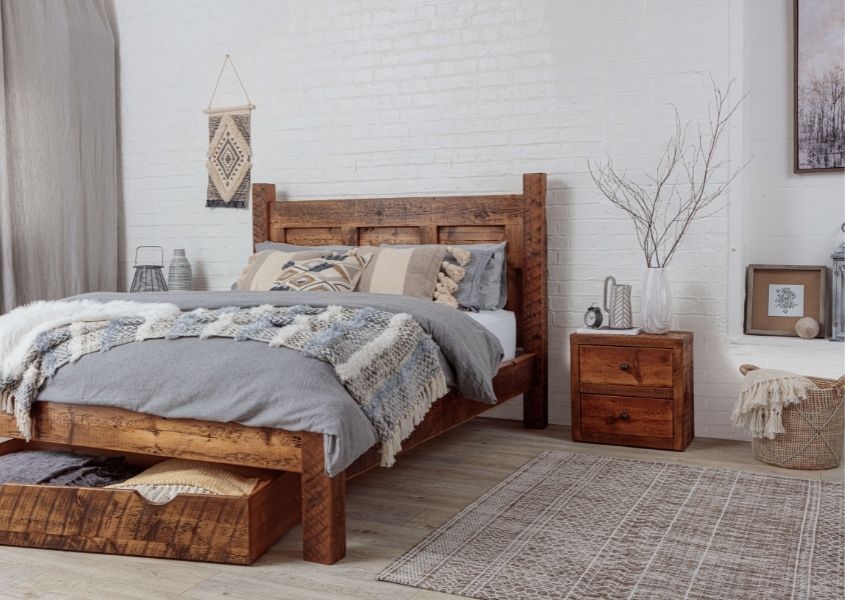 reclaimed wood bed frame with grey covers, matching under bed drawer and small bedside table