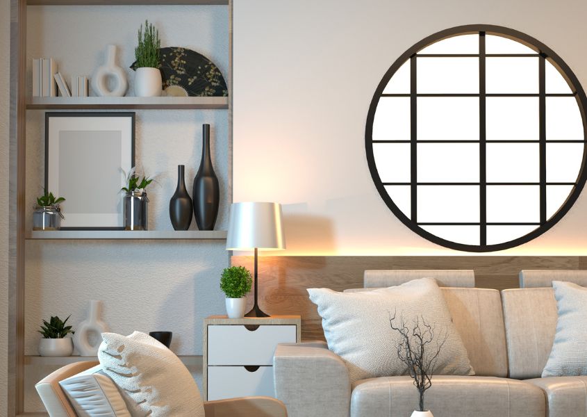 living room with large round mirror and rustic shelves
