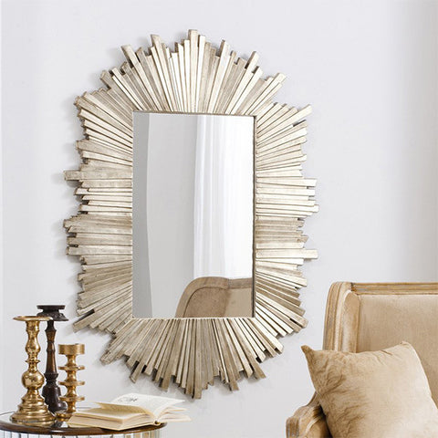Celestial Gold Mirror in Living Room with Candle holders and Sofa