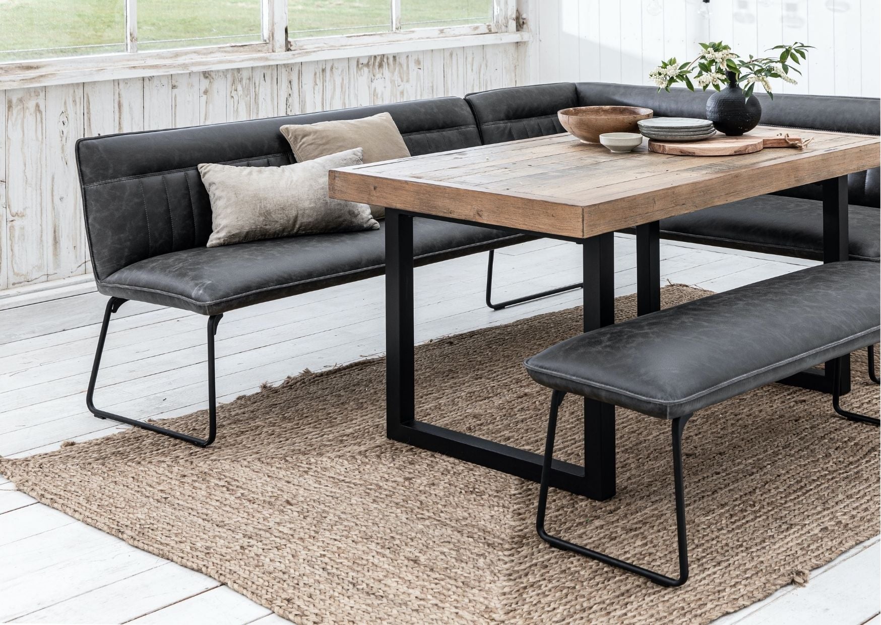 industrial dining table with grey faux leather dining bench