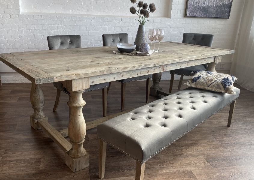 Reclaimed wood dining table with fabric dining bench