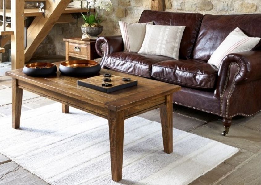 mango wood coffee table and dark brown leather sofa