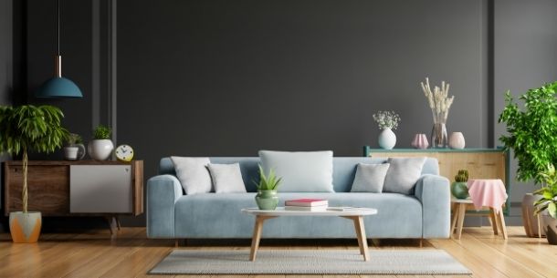 Grey fabric sofa in dark grey living room