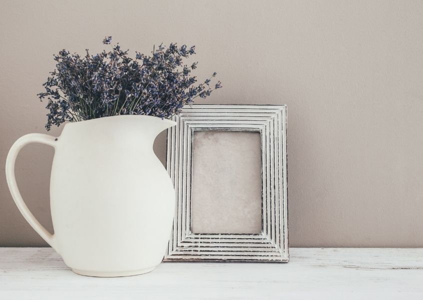 white jug with lavender and silver picture frame for French farmhouse decor blog