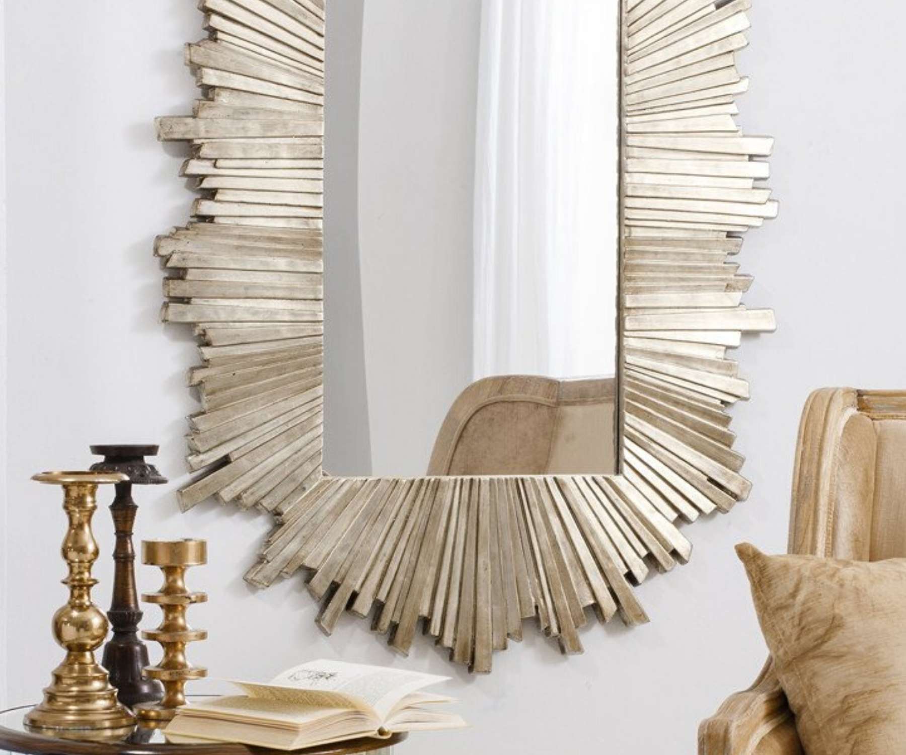 gold wall mirror and candle sticks