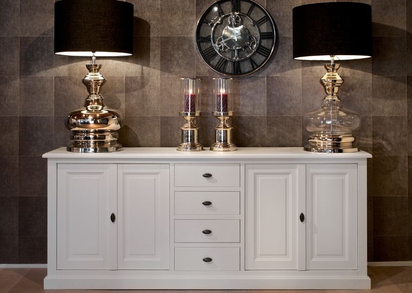 Large white sideboard with two table lamps