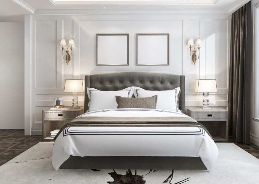 white hotel bedroom with grey king size bed frame