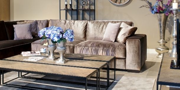 Velvet corner sofa with industrial coffee table