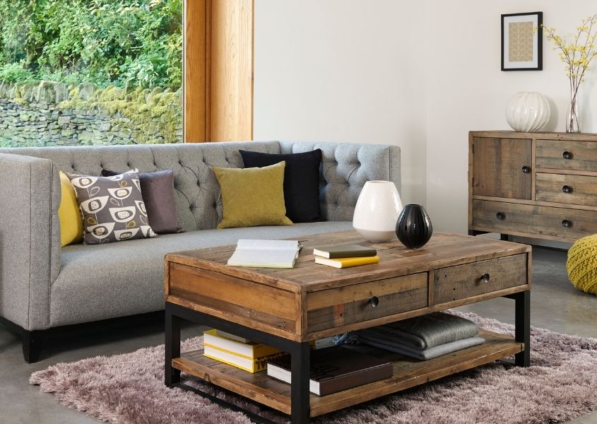 industrial coffee table with modern grey sofa