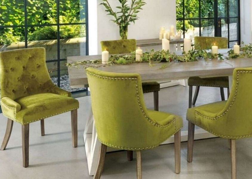 Reclaimed wood dining table with lime green fabric dining chairs