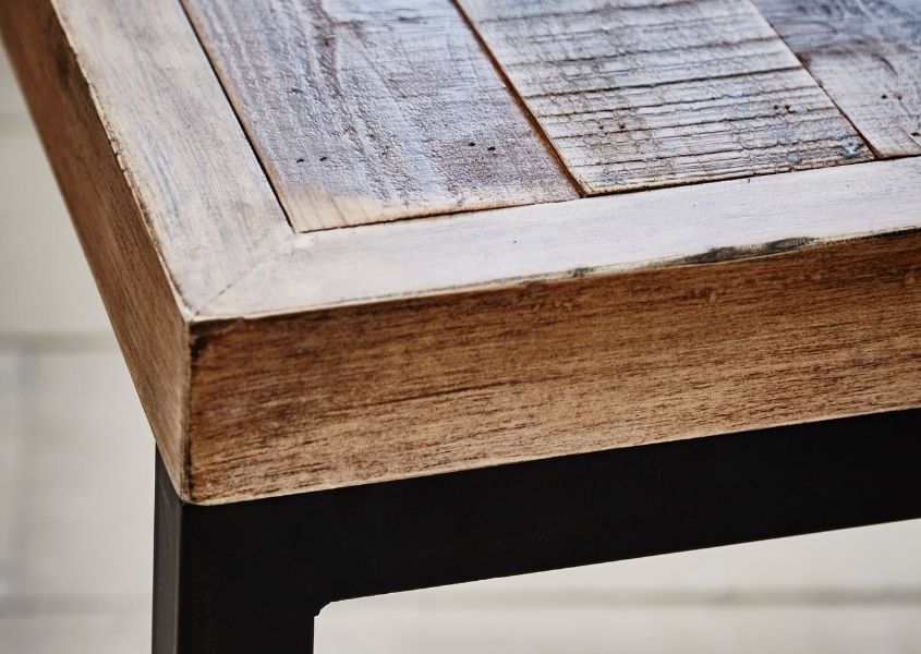 reclaimed wood table top with black metal legs