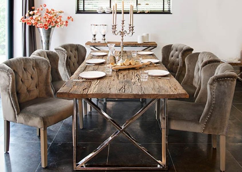 Rustic reclaimed wood dining table with grey fabric dining chairs