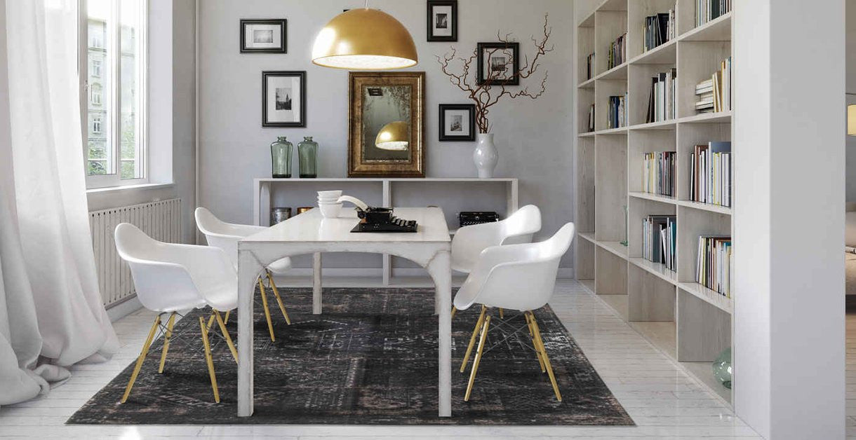 Louis de Poortere rug in dining room with white dining table