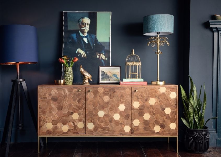 mango wood sideboard with blue table lamp