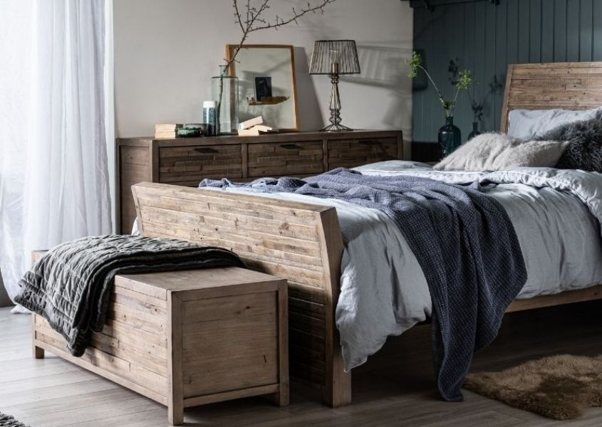 reclaimed wooden bed frame with wooden blanket box
