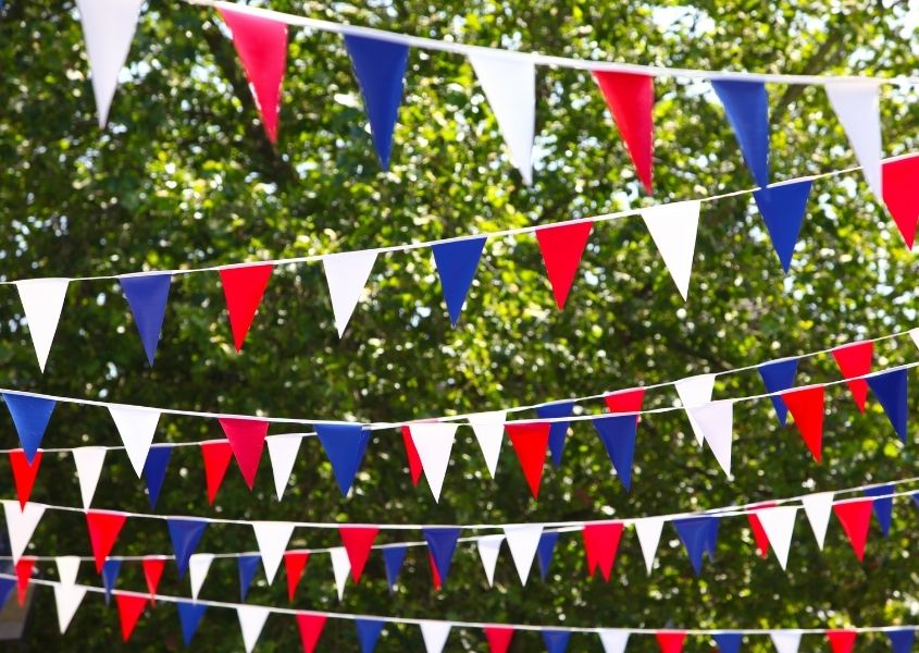 red, white and blue bunting for platinum jubilee garden party ideas blog