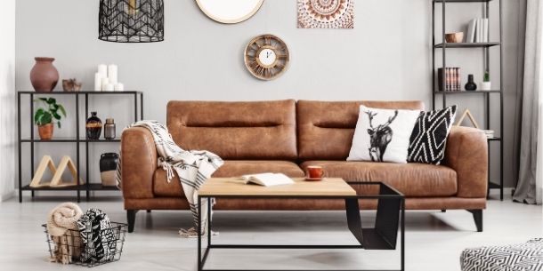 Brown leather sofa with industrial coffee table