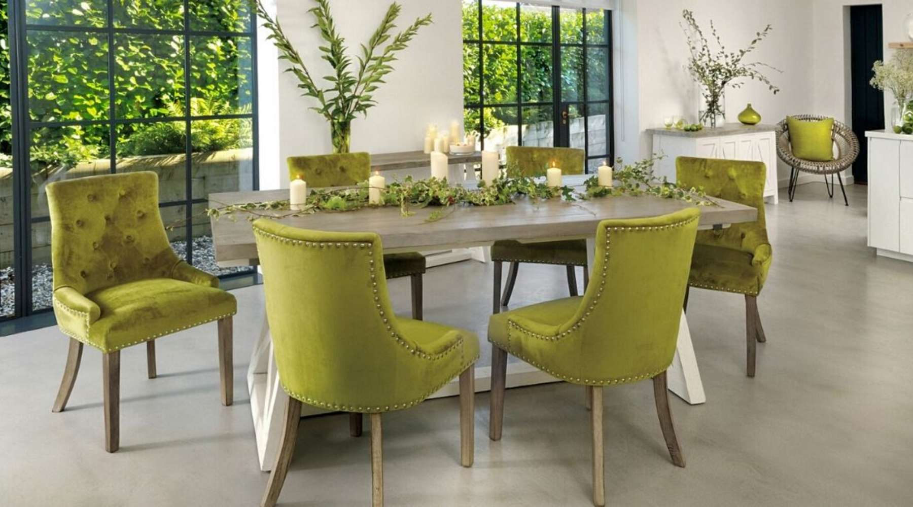 reclaimed wood dining table and green velvet dining chairs