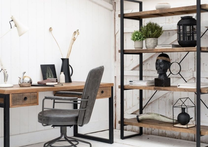Industrial style home office with reclaimed wood industrial desk, industrial bookcase and grey faux leather swivel desk chair
