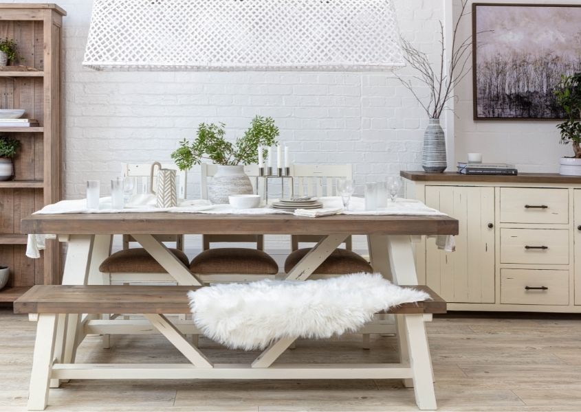 reclaimed wood dining table with white painted trestle leg