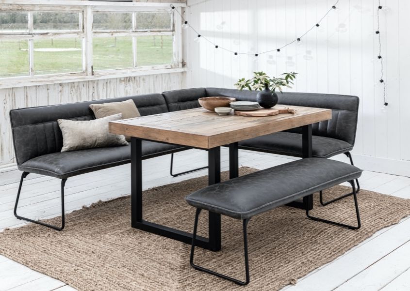 industrial dining table with grey faux leather corner dining bench