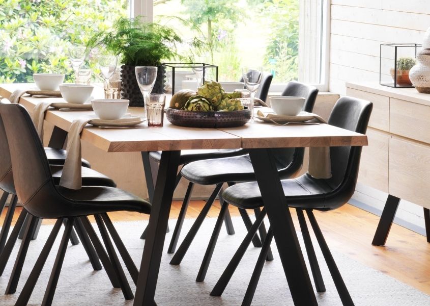 wooden dining table with black wooden legs