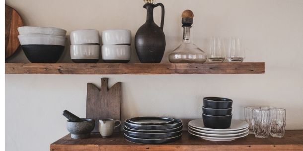 Rustic wooden shelves with plates